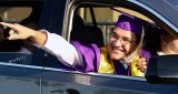 Luis Renteria, bound for Harvard, waves to friends.